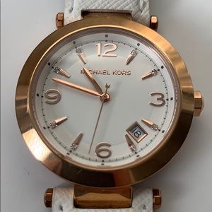 Michael Kors gold and white watch. Worn often.